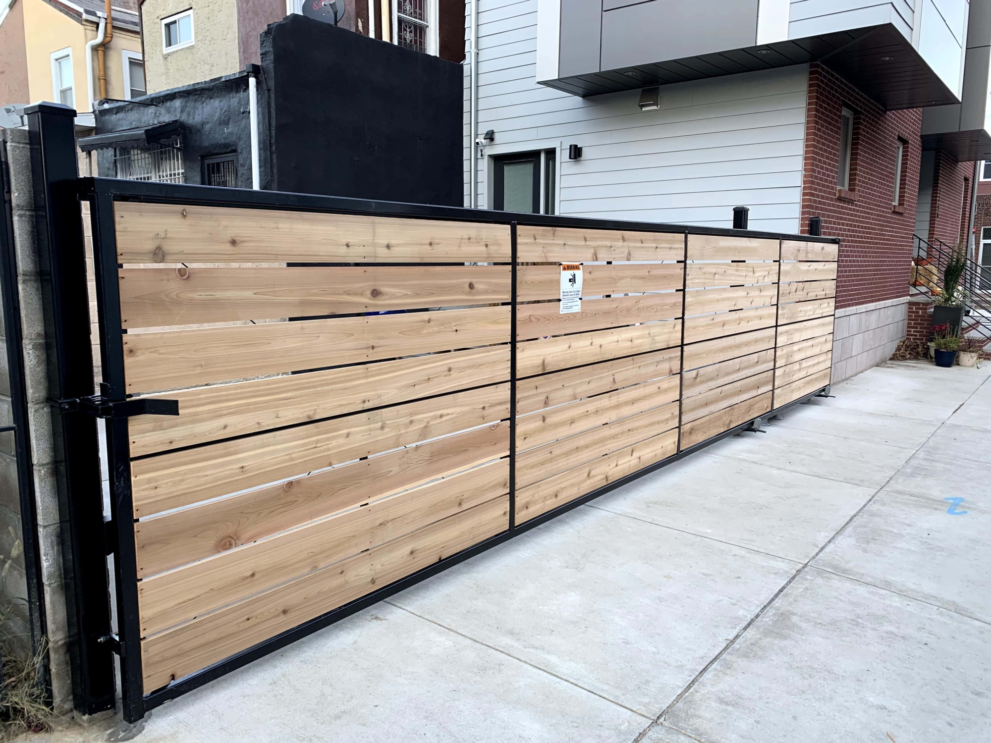wood and metal driveway gate