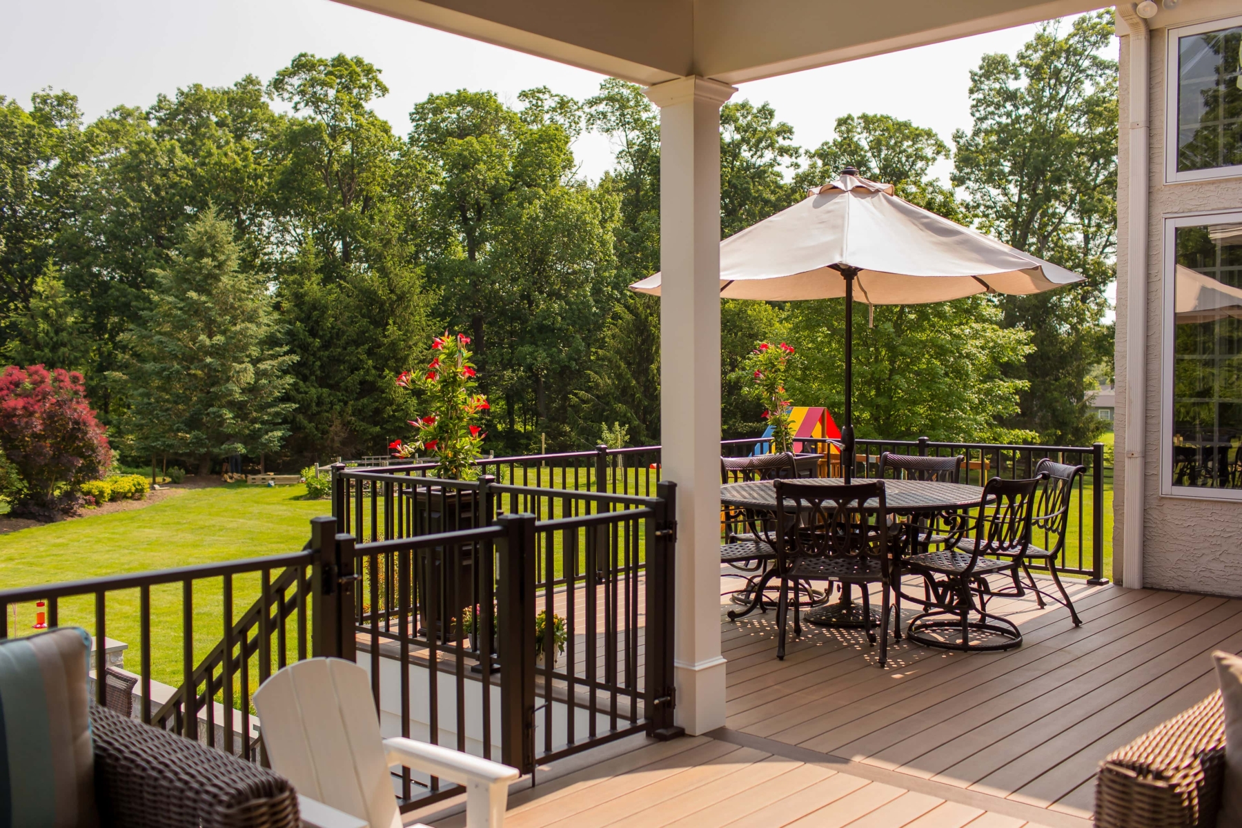 Expansive Backyard Deck and Patio - Malvern, PA - Integrous Fences and ...