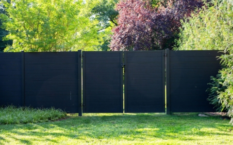 black fence with aluminum posts