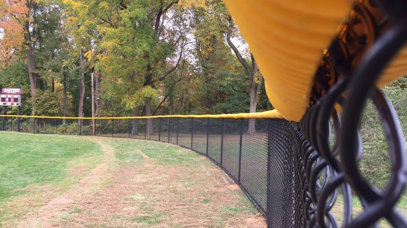 chain link fence around baseball field