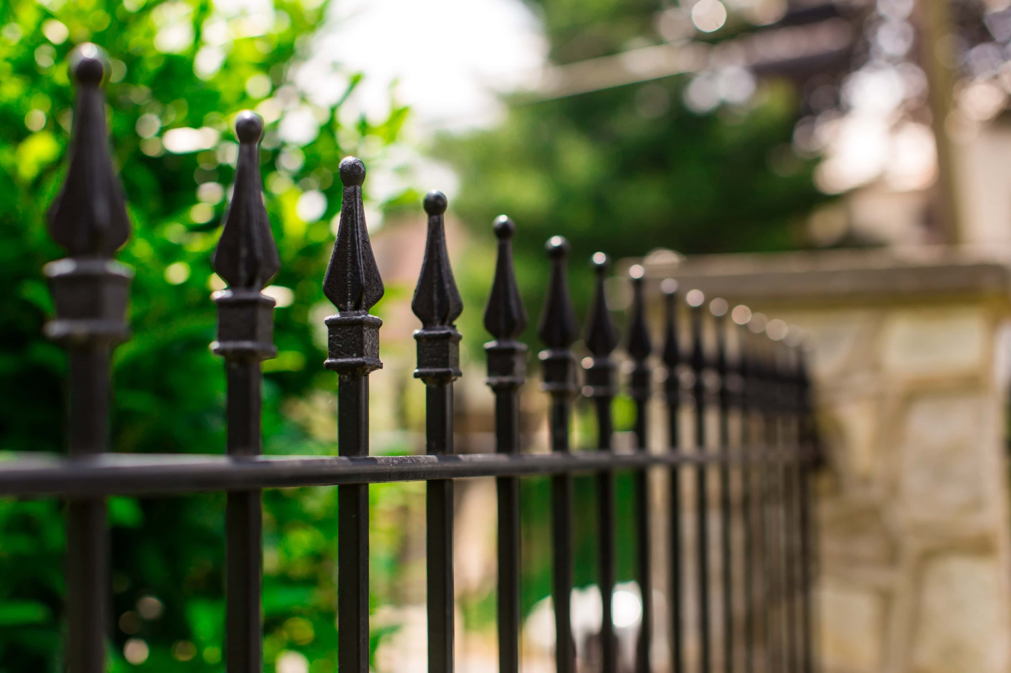 steel fence with quad-finial top