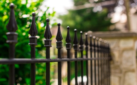 steel fence with quad-finial top