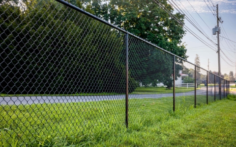 6' tall commercial grade black chain link fence with 2x9 black vinyl coated chain link fabric
