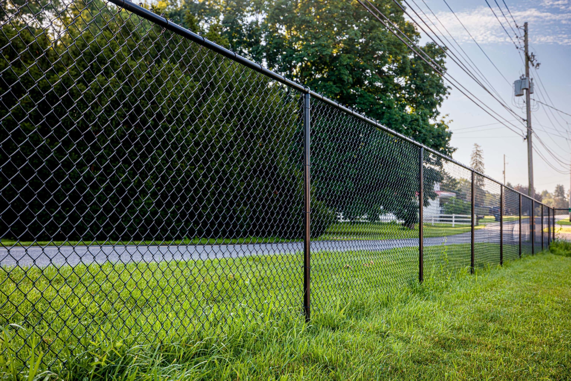 6' tall commercial grade black chain link fence with 2x9 black vinyl coated chain link fabric