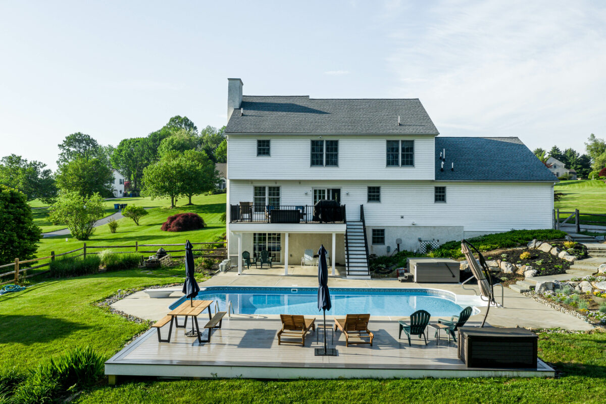 Sun Deck, TimberTech Azek Slate Gray Island Oak Wesbury Railing Black Aluminum sun deck pool deck water system