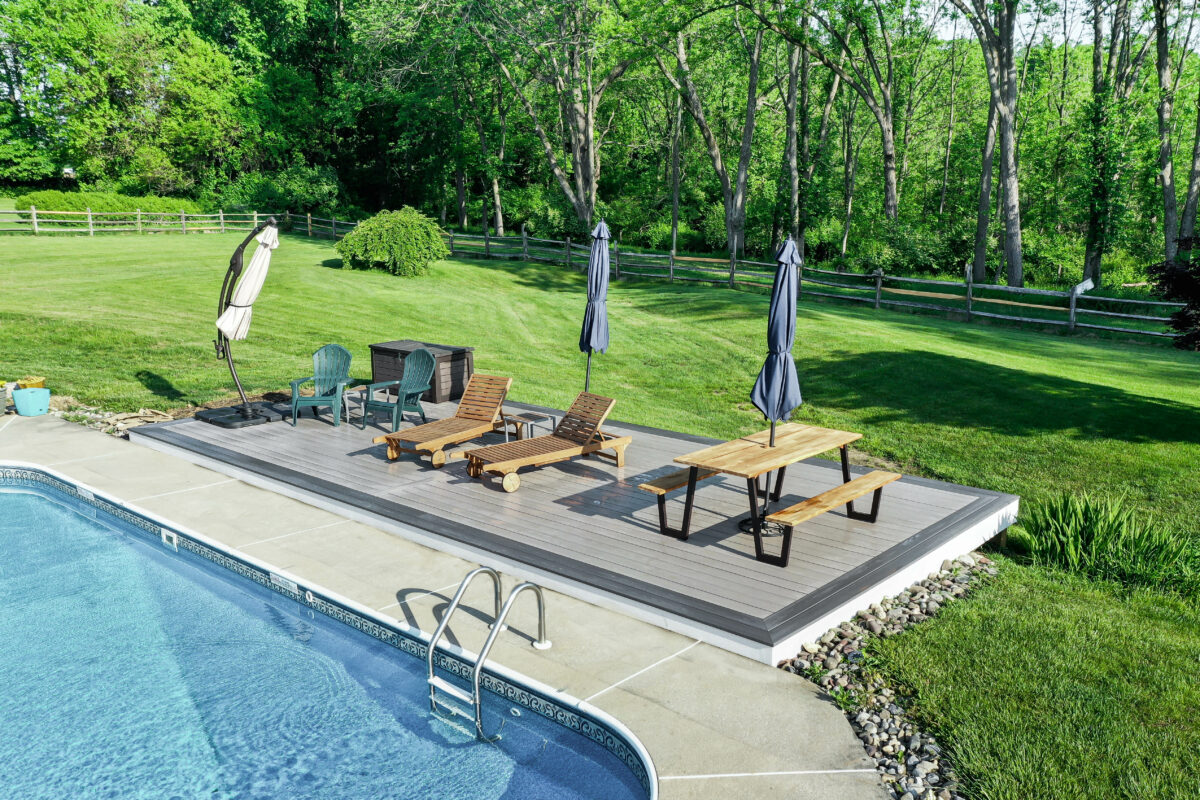 Sun Deck, TimberTech Azek Slate Gray Island Oak Wesbury Railing Black Aluminum sun deck pool deck water system