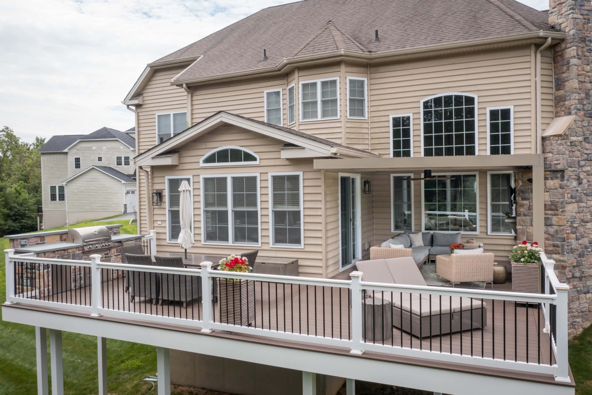 deck with louvered roof and outdoor kitchen