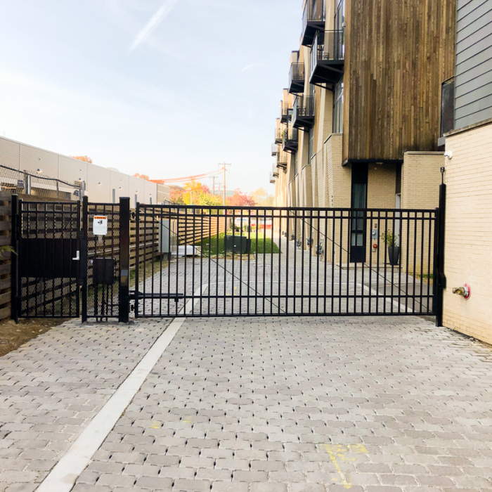 black metal automated entrance gate