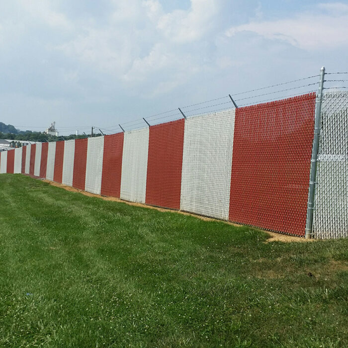 Chain link fence with privacy slats