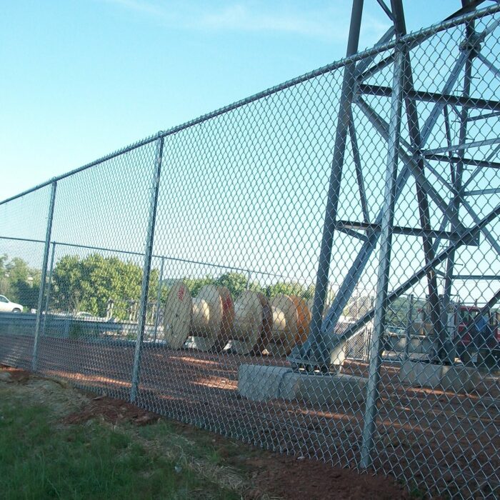 Chain link fence around tower