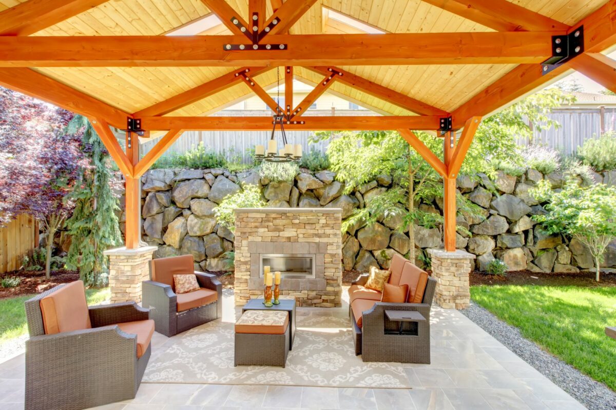 Outdoor covered patio with fireplace
