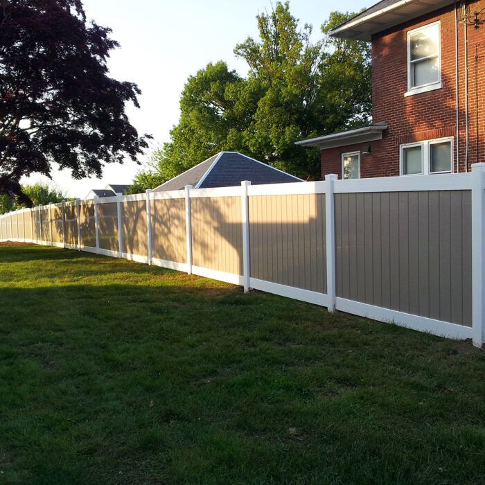 white and khaki two-tone privacy fence