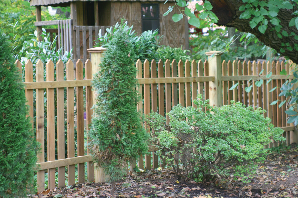 wood picket fence with post caps