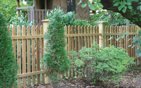 wood picket fence with post caps