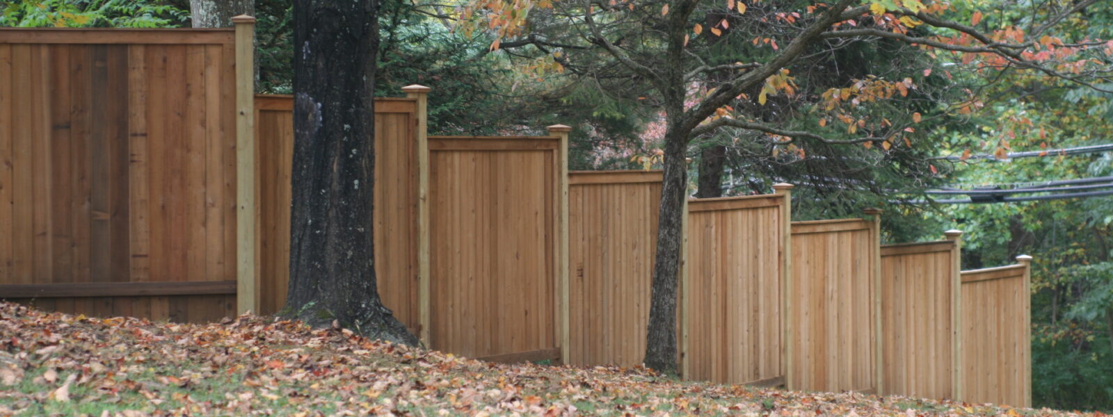 stepped wood sound abatement fence