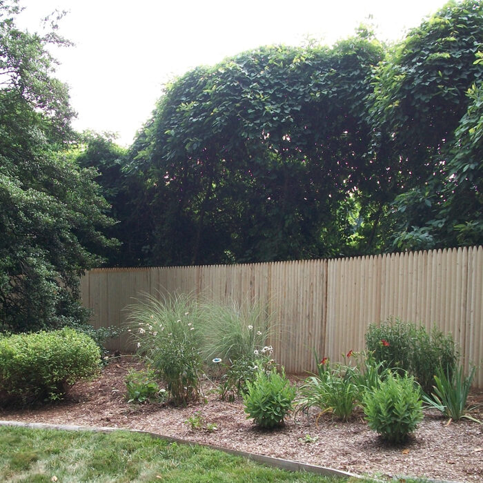 Stockade fence in yard