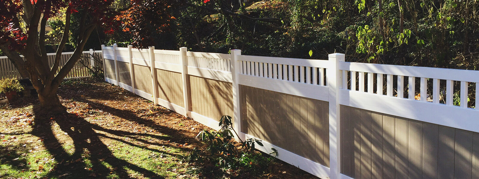 vinyl privacy fence in white and khaki colors