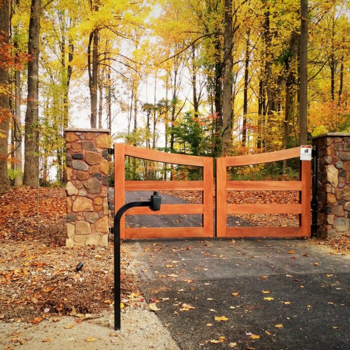 wood rail driveway gate with automated opener