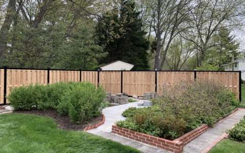 6' tall metal and cedar wood privacy fence