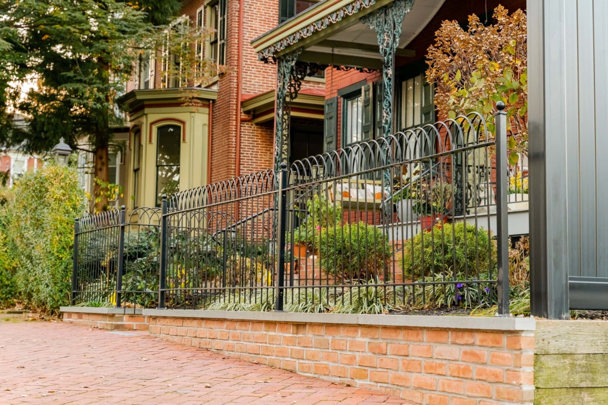 black curved metal fence