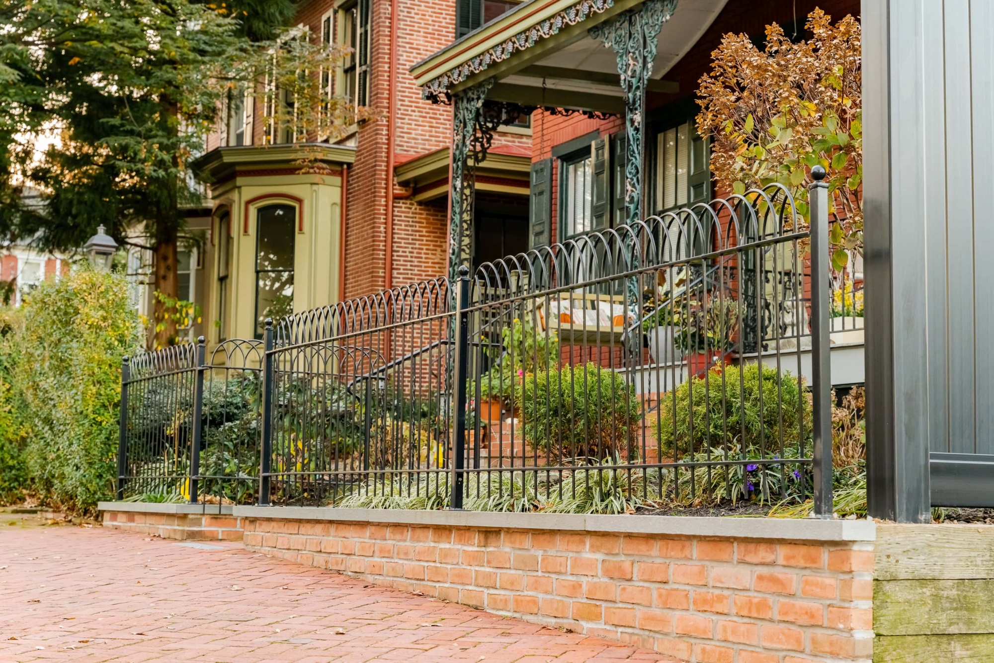 black curved metal fence