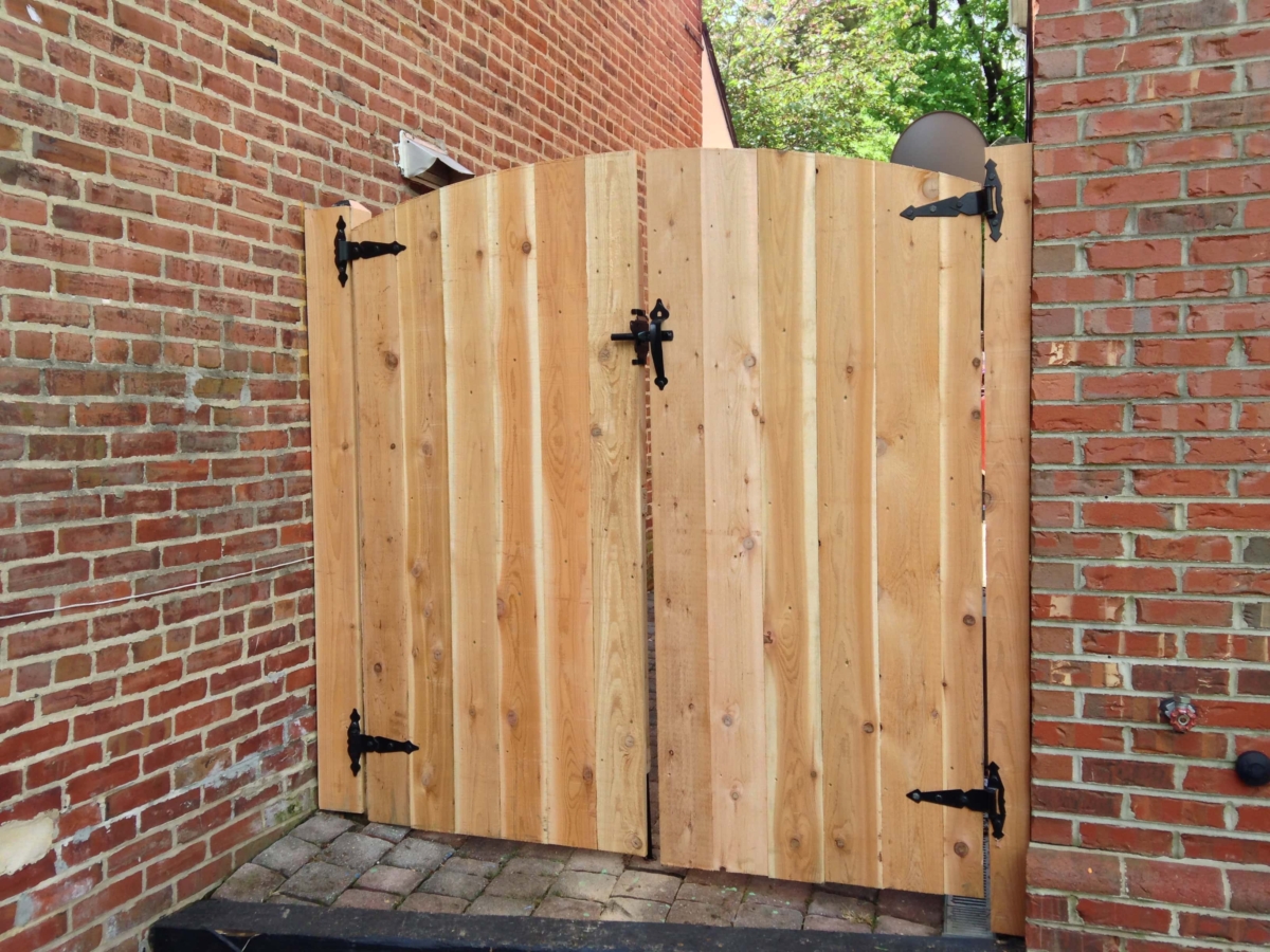 wood gate with concave top