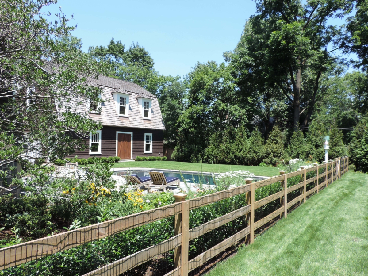 wood ranch rail around pool