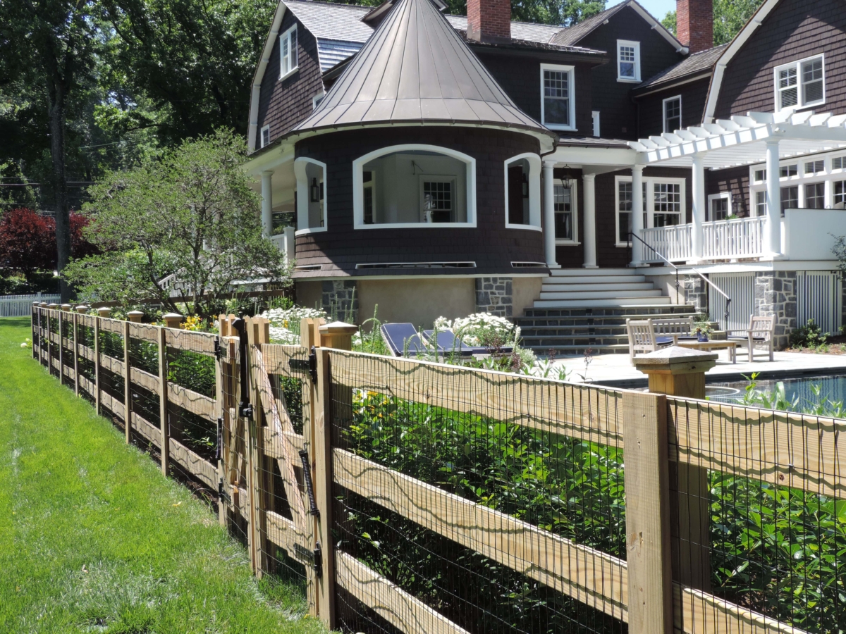three rail fence with wire mesh