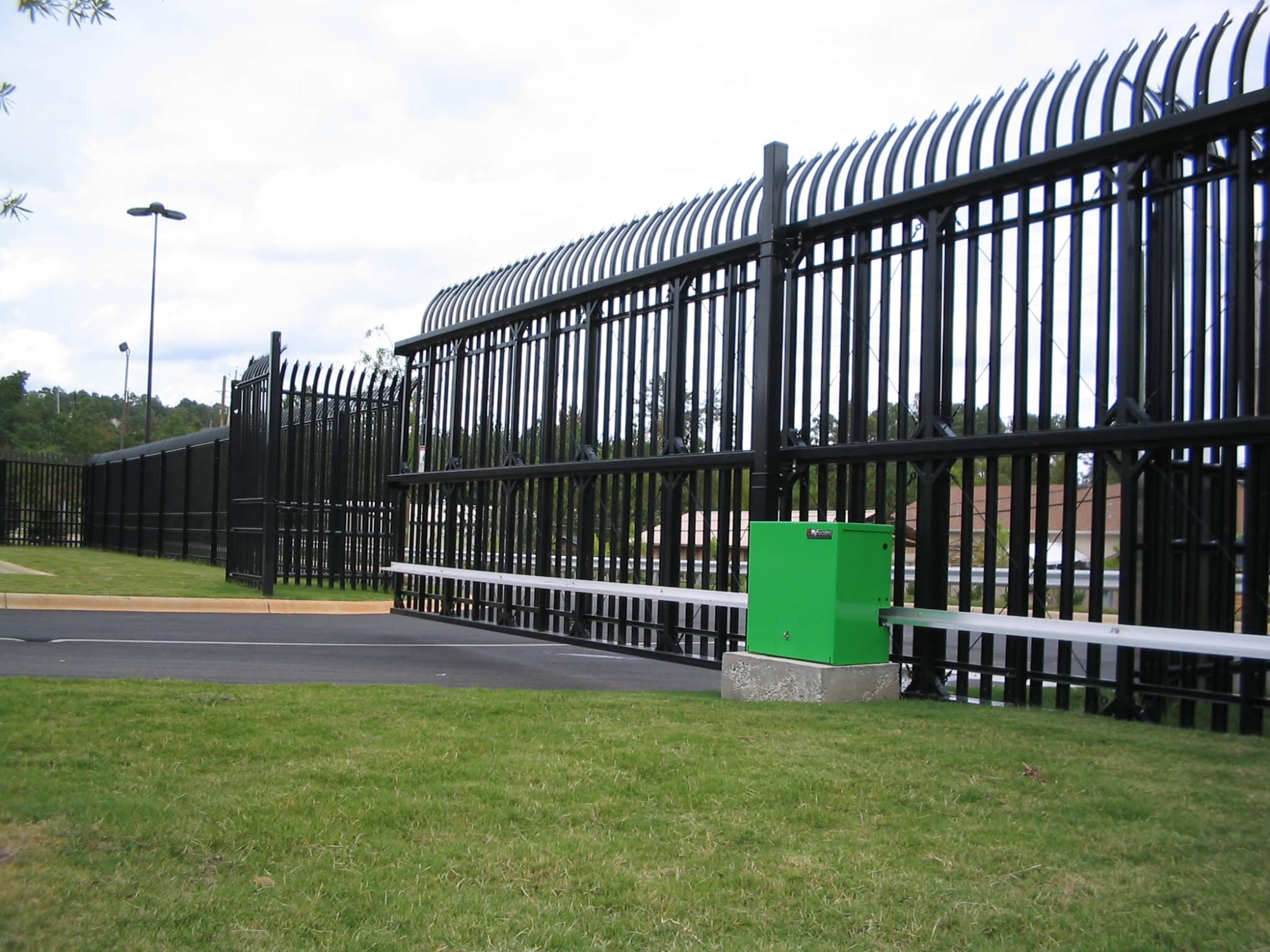 black metal fence around commercial property