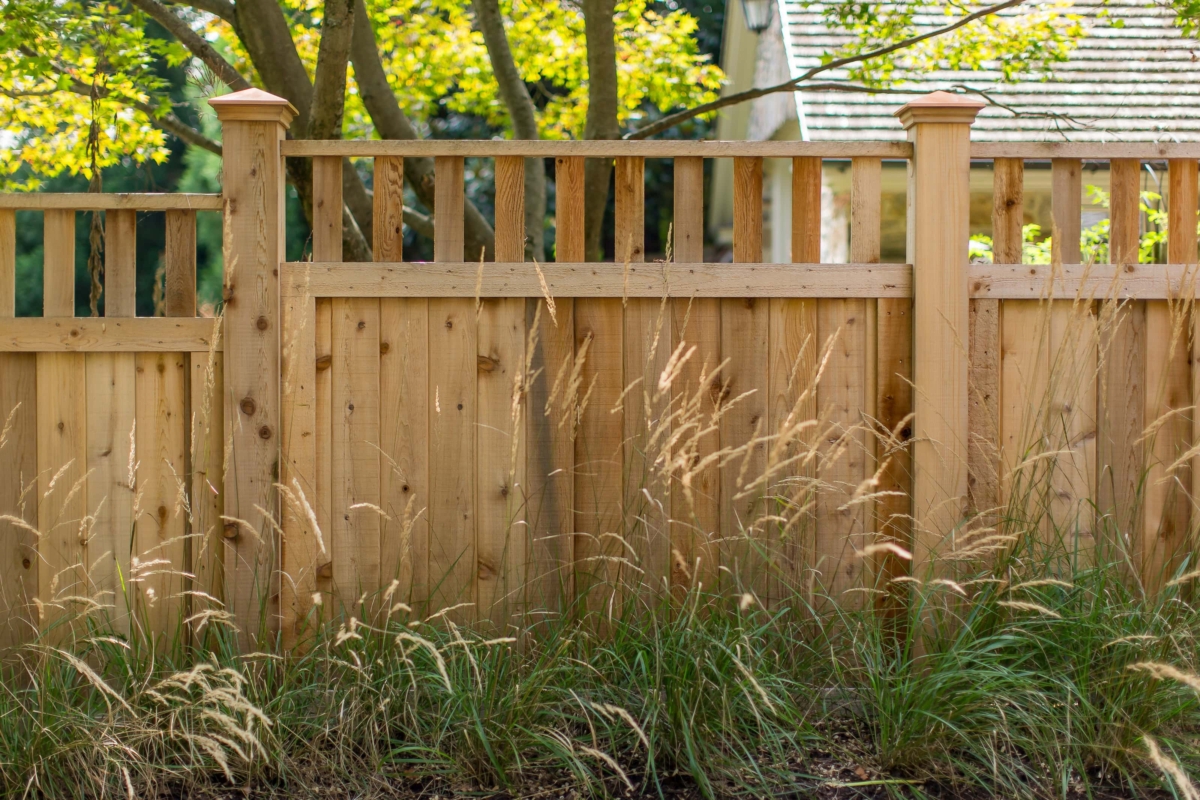 wood 6' tall privacy fence with spindle top