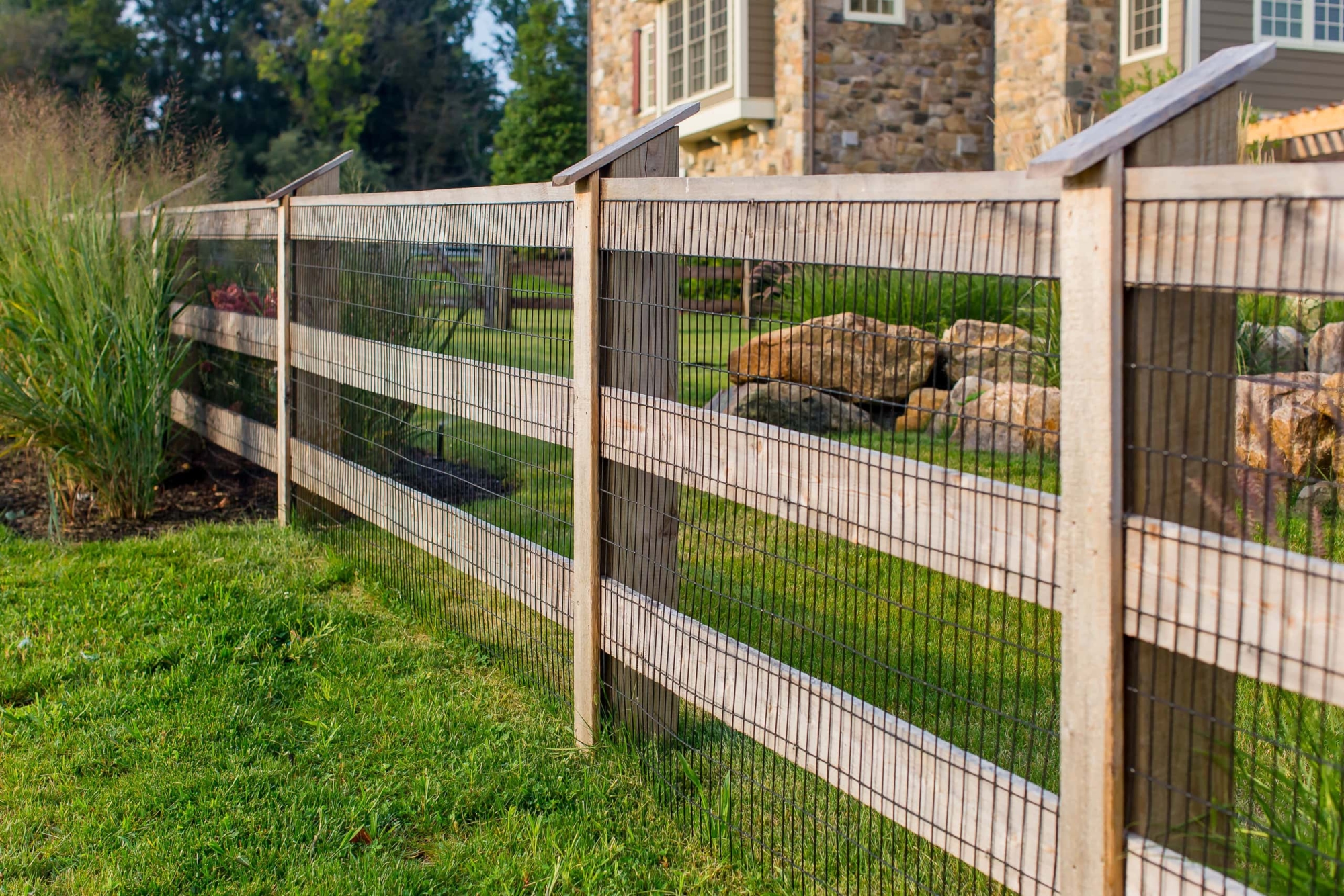 Wood Split Rail Fence with Wire Mesh