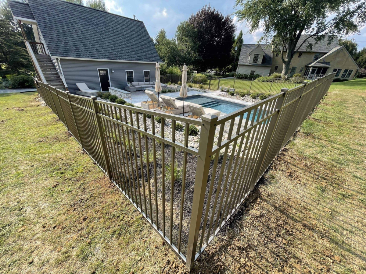 metal fence surrounding a pool