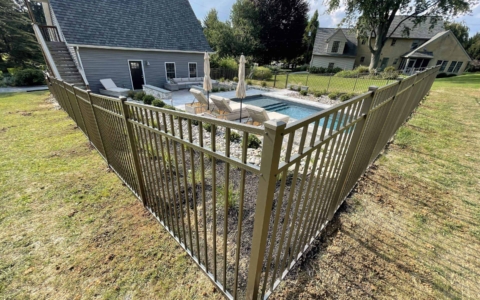 metal fence surrounding a pool