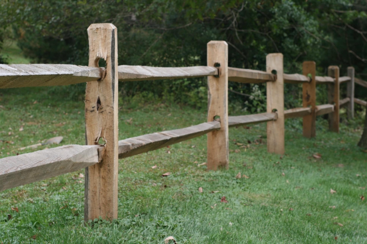 wood two rail split rail fence