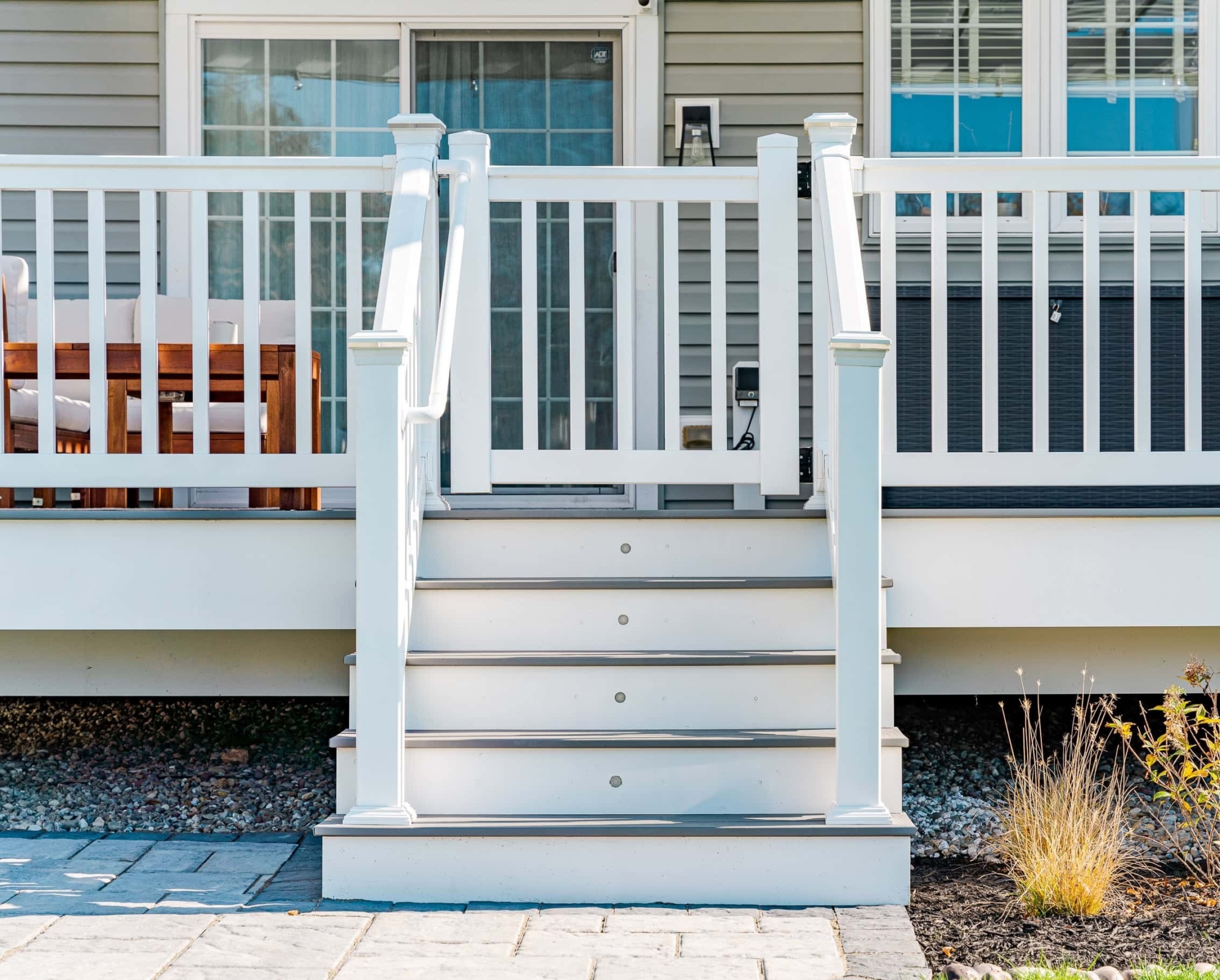 white vinyl railing on deck stairs