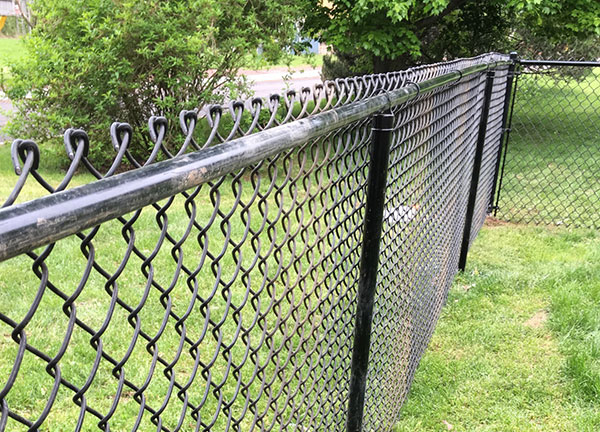 Chain link fence with black vinyl piping