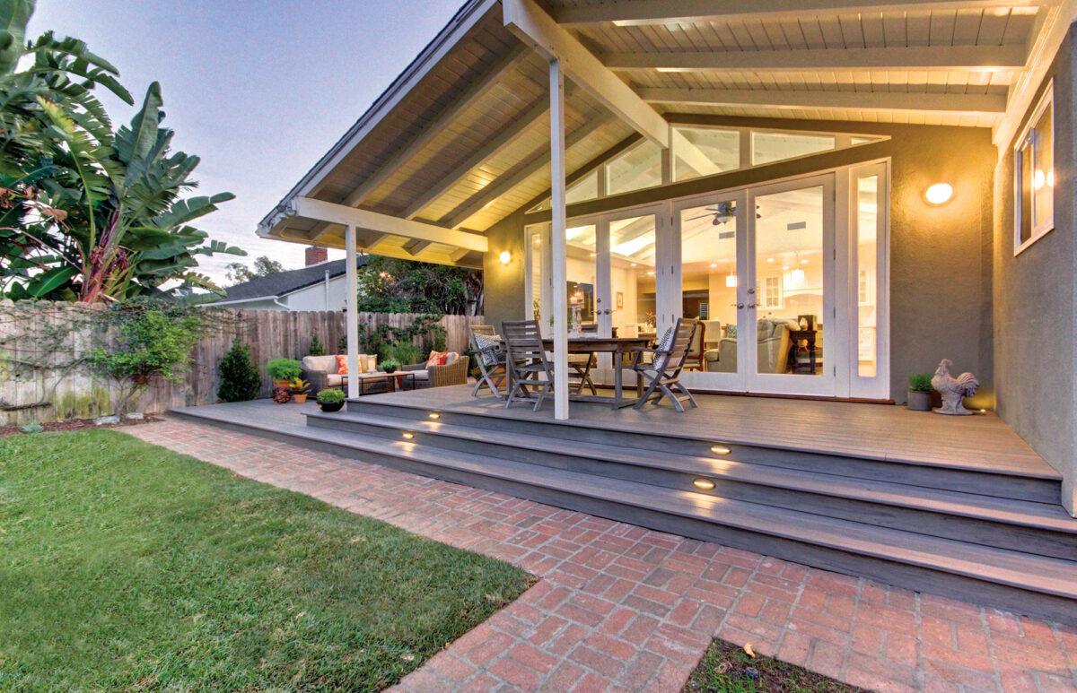 Well-lit covered backyard deck