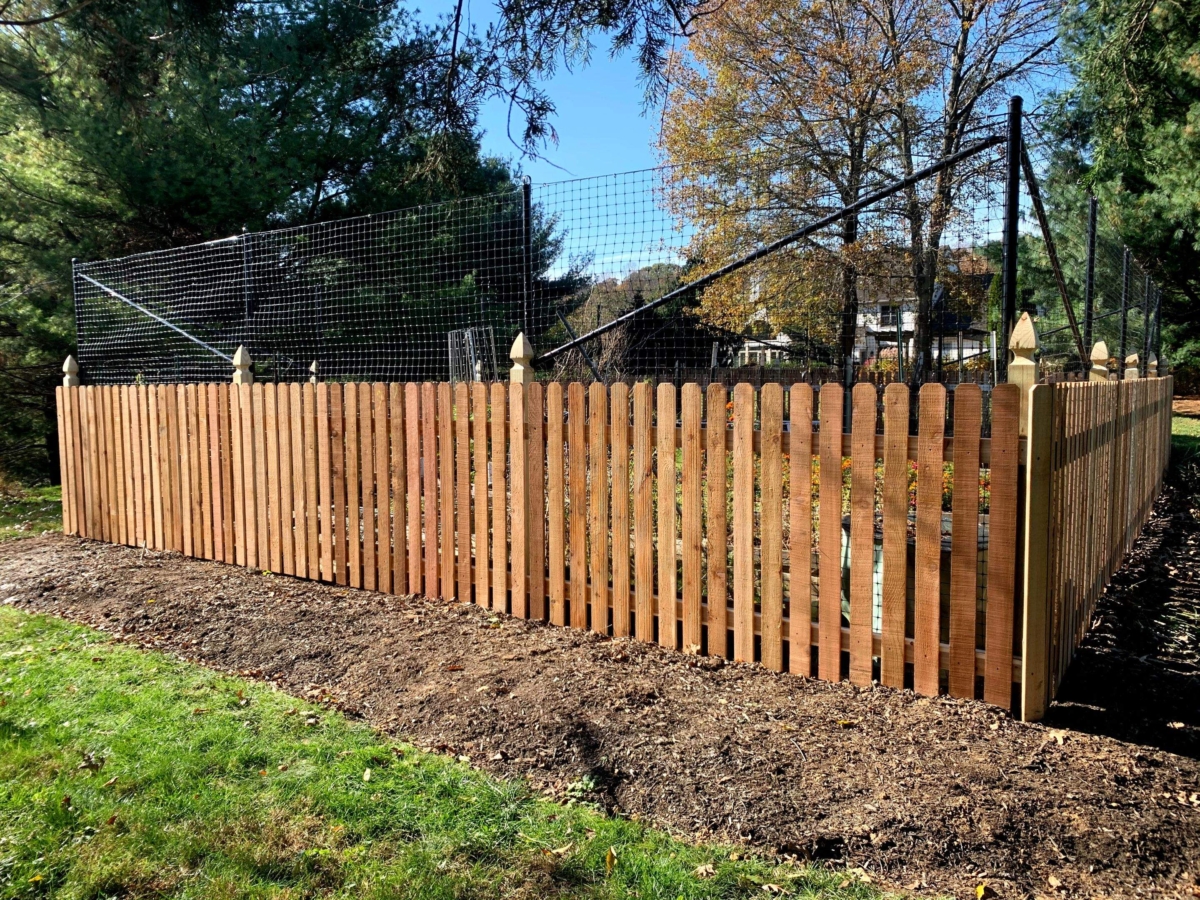 4' wood picket fence with decorative post caps