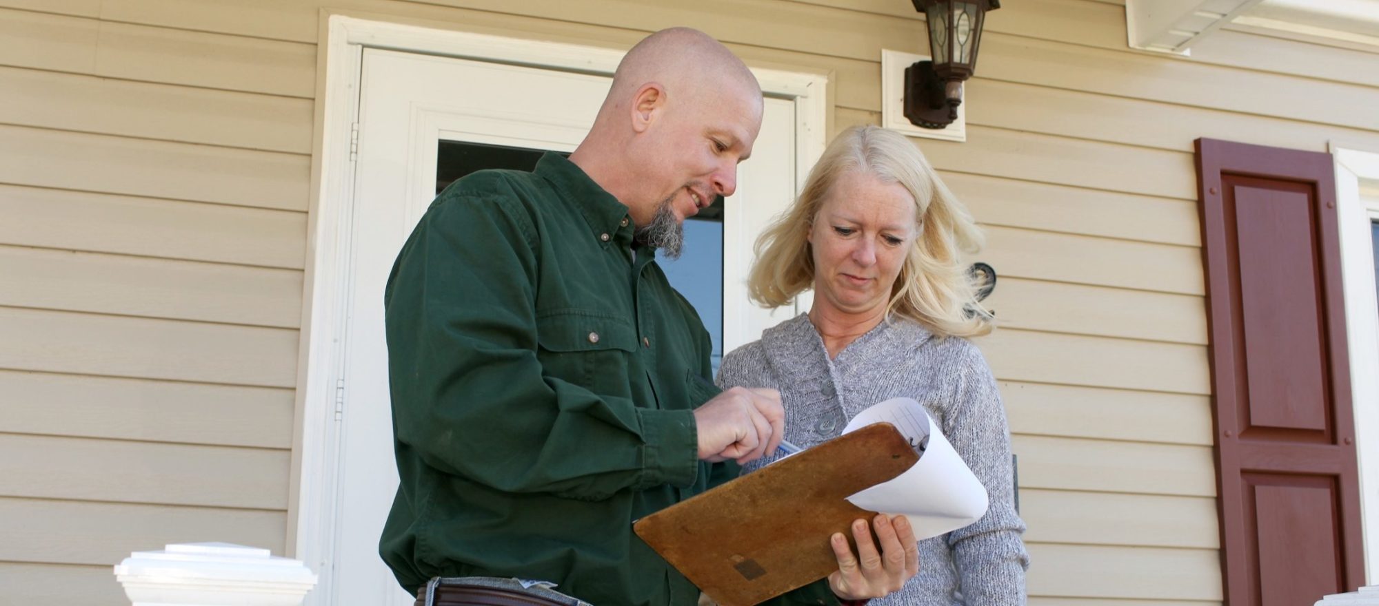 Contractor going over details of home inspection.