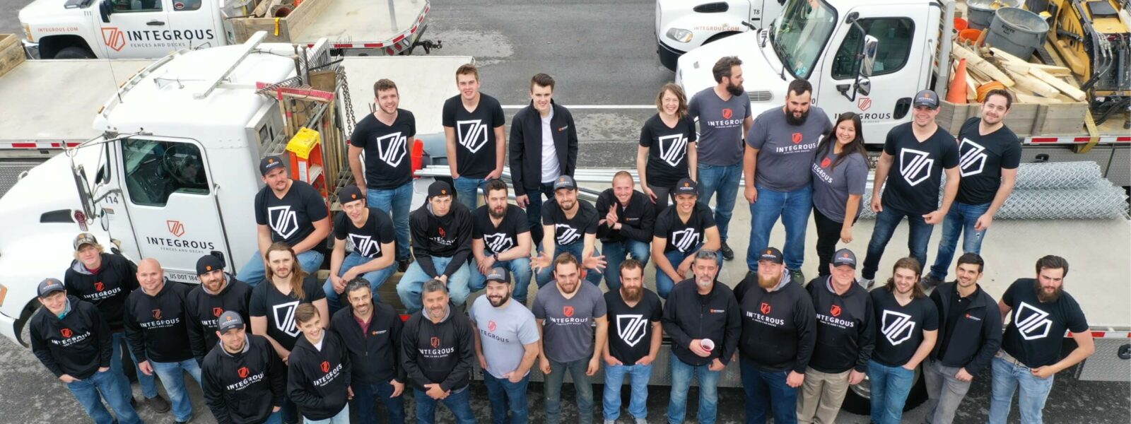 Company picture in front of truck